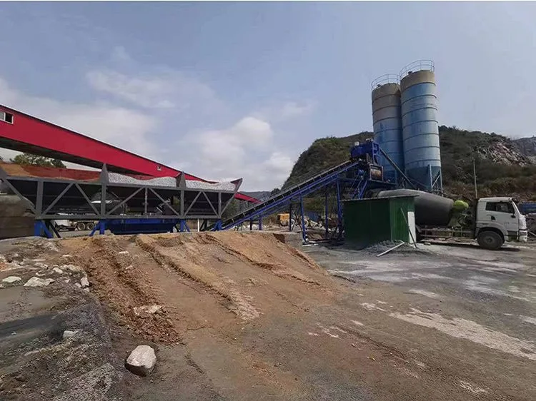 Misturador de concreto de duplo eixo da série JS recebendo manutenção de lubrificação de rotina durante a fase de comissionamento